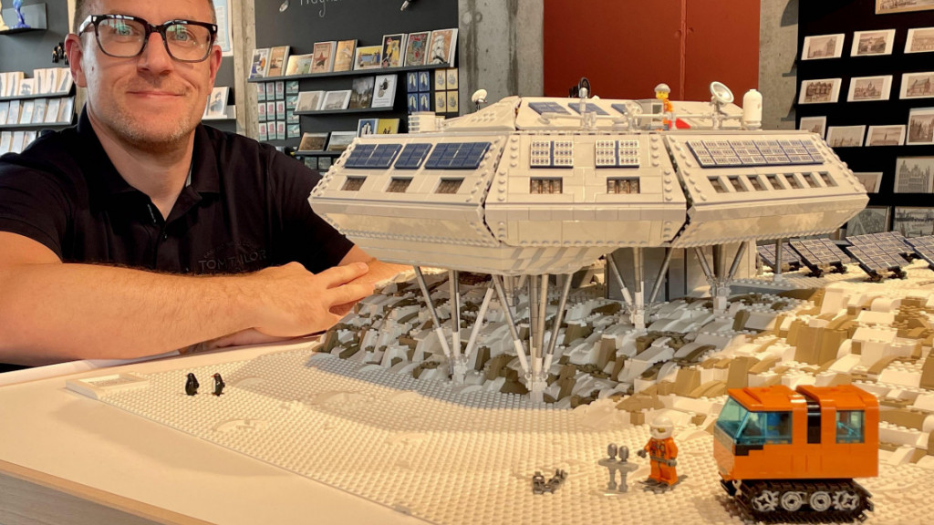 Lego enthusiast Daniel Vermeir poses with his scale replica of the Princess Elisabeth Antarctica