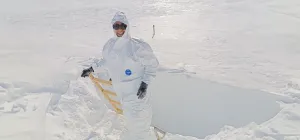 Paula in a snow pit taking samples of snow for PASPARTOUT project